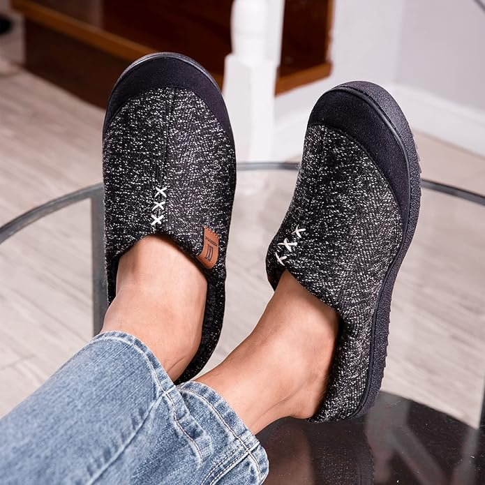 man relaxing in comfortable men's house slippers
